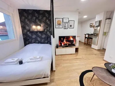 Un ou plusieurs lits dans un hébergement de l'établissement Paris 24 - Studio calme, cosy proche centre Reims