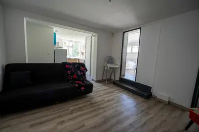Coin salon dans l'établissement Bright villa floor with terrace and garden