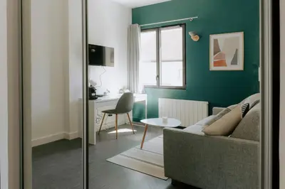 Télévision ou salle de divertissement dans l'établissement Immi Immobilier - Studio Cozy & Équipé