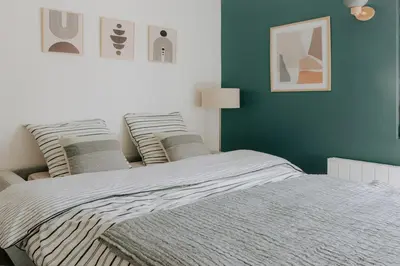 Un ou plusieurs lits dans un hébergement de l'établissement Immi Immobilier - Studio Cozy & Équipé