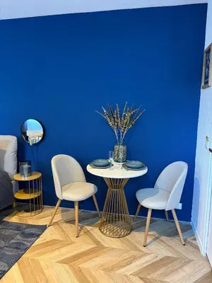 Coin salon dans l'établissement Évasion Bleu Champagne & son Parking Privé