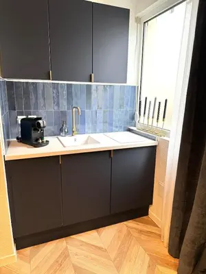 Cuisine ou kitchenette dans l'établissement Évasion Bleu Champagne & son Parking Privé