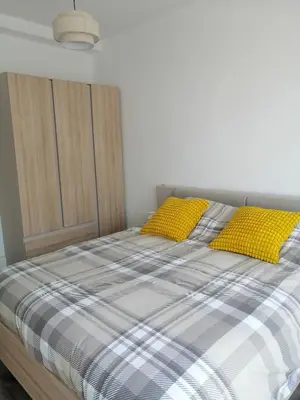 Un ou plusieurs lits dans un hébergement de l'établissement Appartement Lumineux