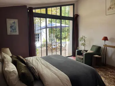 Un ou plusieurs lits dans un hébergement de l'établissement Le Clos des Lilas