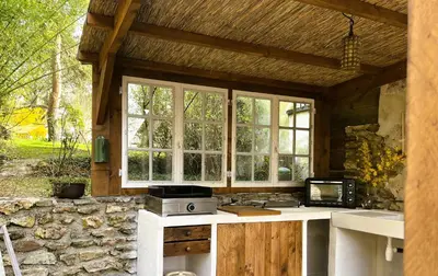 Cuisine ou kitchenette dans l'établissement Le Clos des Lilas