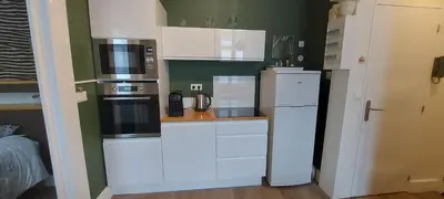 Cuisine ou kitchenette dans l'établissement Le Gobelin Champenois - Appartement - Reims