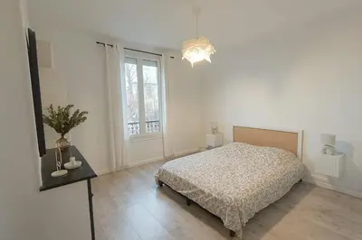 Un ou plusieurs lits dans un hébergement de l'établissement Appartement lumineux proche hyper-centre