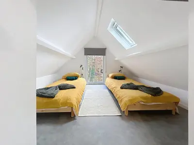 Un ou plusieurs lits dans un hébergement de l'établissement L'Orée - le calme de la forêt - 10 min de Pierrefonds