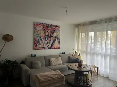 Coin salon dans l'établissement Apartment close to Place Luton