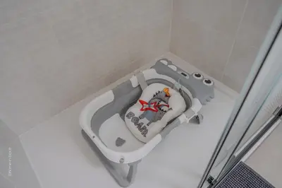 Salle de bains dans l'établissement T2 familial avec jardin, calme à 15 min de Disney