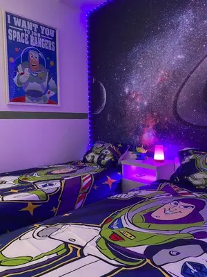 Un ou plusieurs lits dans un hébergement de l'établissement Chez Woody & Buzz - 10 minutes Disneyland Paris