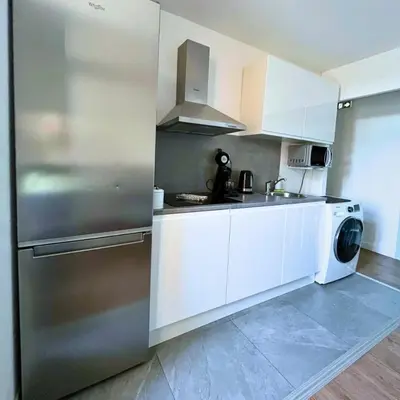 Cuisine ou kitchenette dans l'établissement Combo centre-ville - 8 pers - 3 chambres avec salle de bain
