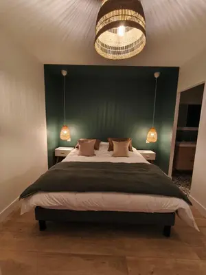 Un ou plusieurs lits dans un hébergement de l'établissement Studio à la Ferme