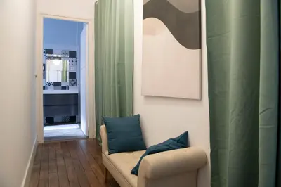 Cuisine ou kitchenette dans l'établissement Le Saint-Quentin - Studio avec Terrasse