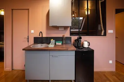 Cuisine ou kitchenette dans l'établissement Escale Tropical Chic - Hypercentre St-Quentin