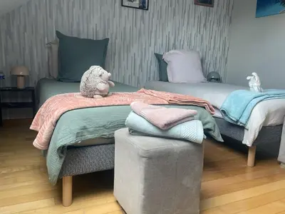 Un ou plusieurs lits dans un hébergement de l'établissement Macasa chambres et table d'hôte