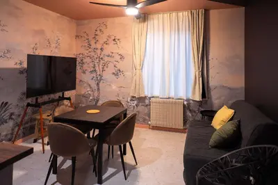Télévision ou salle de divertissement dans l'établissement Le Jardin Secret - Zen en Centre St-Quentin