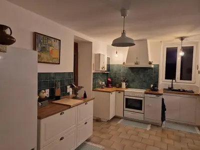 Cuisine ou kitchenette dans l'établissement Bienvenue Chez Papy