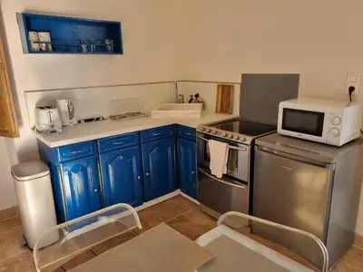 Cuisine ou kitchenette dans l'établissement Gite du Bois de Lord