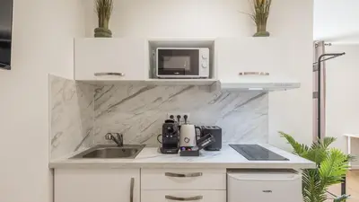 Cuisine ou kitchenette dans l'établissement Manu Chalons