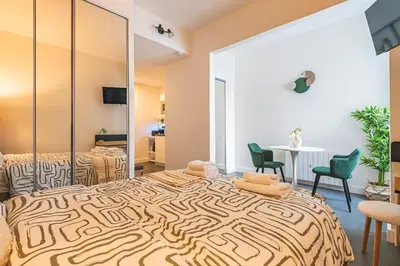 Un ou plusieurs lits dans un hébergement de l'établissement Immi Immobilier - Studio Moderne & Équipé