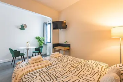 Un ou plusieurs lits dans un hébergement de l'établissement Immi Immobilier - Studio Moderne & Équipé