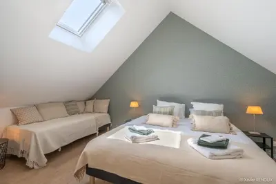 Un ou plusieurs lits dans un hébergement de l'établissement La Grange Patton