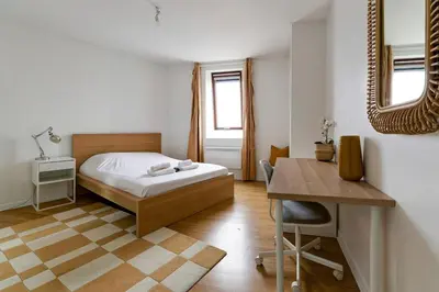 Un ou plusieurs lits dans un hébergement de l'établissement Cosy 3ch lumineux, central & calme, 8 pers