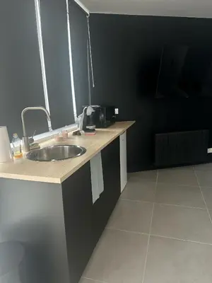 Cuisine ou kitchenette dans l'établissement Cosy Love Room