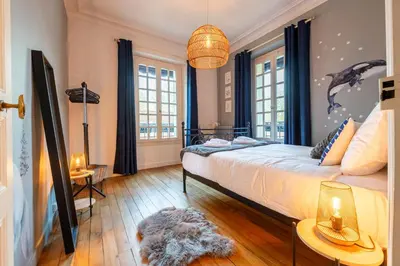 Un ou plusieurs lits dans un hébergement de l'établissement Villa Les Roches - Confort & Relaxation