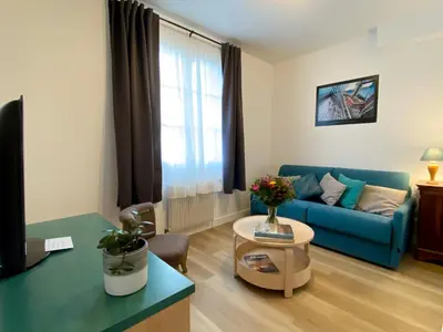 Coin salon dans l'établissement Appartement proche Château de Compiègne