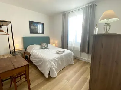 Un ou plusieurs lits dans un hébergement de l'établissement Appartement proche Château de Compiègne