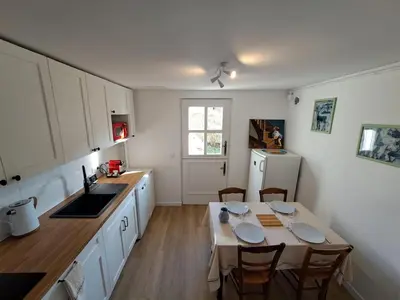 Cuisine ou kitchenette dans l'établissement Appartement proche Château de Compiègne