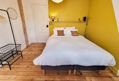 Un ou plusieurs lits dans un hébergement de l'établissement Le Relais de l'Écluse - nature lodge on an island