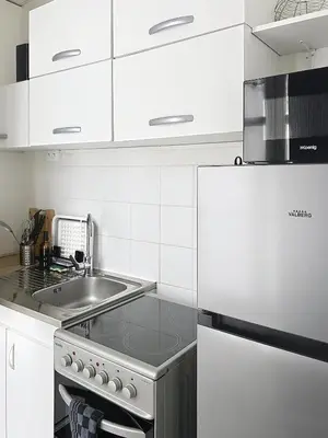 Cuisine ou kitchenette dans l'établissement Le Antoine