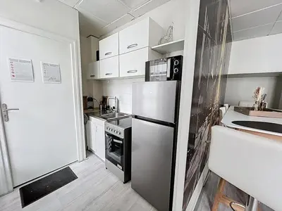 Cuisine ou kitchenette dans l'établissement Le Antoine