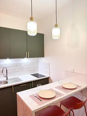 Cuisine ou kitchenette dans l'établissement T2 Cosy - Proche centre - Stationnement gratuit