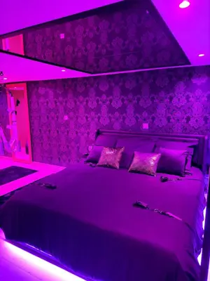 Un ou plusieurs lits dans un hébergement de l'établissement Loveroom LovaLova