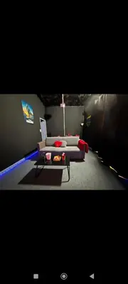 Télévision ou salle de divertissement dans l'établissement Instant Cinéma-Détente et Romantisme