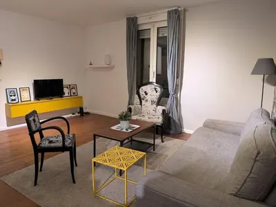 Télévision ou salle de divertissement dans l'établissement Le 49 Leclerc