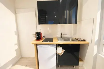 Cuisine ou kitchenette dans l'établissement Urban Duplex
