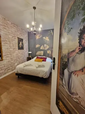 Un ou plusieurs lits dans un hébergement de l'établissement Appartement 4 pers - déco magique immersive - centre Reims