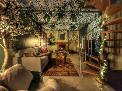 Coin salon dans l'établissement La Forêt Enchantée - Maison avec cheminée et jardin
