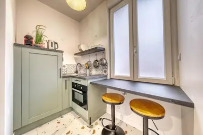 Cuisine ou kitchenette dans l'établissement The Barbatre studio