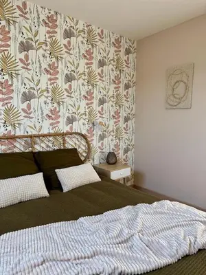 Un ou plusieurs lits dans un hébergement de l'établissement Appartement à Ohain