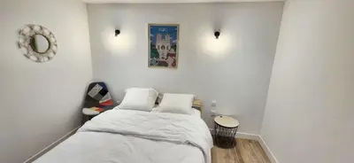 Un ou plusieurs lits dans un hébergement de l'établissement Magnifique Duplex Avec Terrasse, Proche De Av Champagne