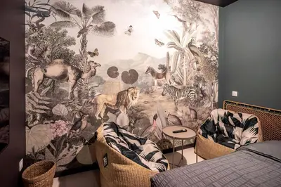 Coin salon dans l'établissement Songe de Savane - Spa Ultra-centre St Quentin