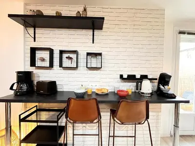 Cuisine ou kitchenette dans l'établissement Luton RDC avec terrasse calme proche centre ville