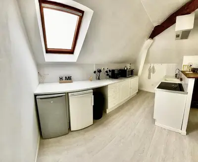 Cuisine ou kitchenette dans l'établissement T3 Cosy & Spacieux, Gare à 1min, Disneyland 15min