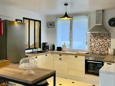 Cuisine ou kitchenette dans l'établissement Havre de paix à Pierrefonds